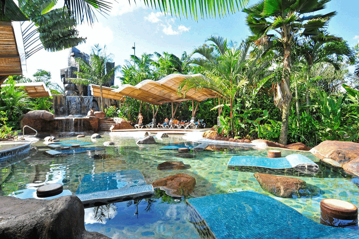 Scenic view of La Fortuna hot springs and volcano